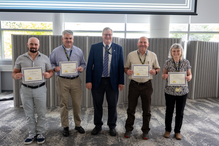 Dr. Parkos celebrates with 30 Years of Service Award Recipients Gonzalo Garcia, John Harris, Todd Kandow, and Colleen McDermott